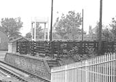 Close up showing the two sets of steps accessing Shirley station's cattle dock and pens and the water tower behind