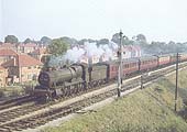 Ex-GWR 4-6-0 No 4991 Cobham Hall approaches Hasluck's Green Road bridge on 29th August 1959