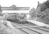 Ex-GWR 2-6-2 No 4127 stands at Shirley station with a down local passenger service on 8th June 1957