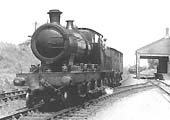 GWR 2-6-0 26xx (Aberdare) class No 2646 shunting on the down main line with two covered wagons circa 1930