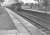 British Railways built to a SR design 4-6-2 West Country class No 34105 'Swanage' passes through Shirley on an empty stock working