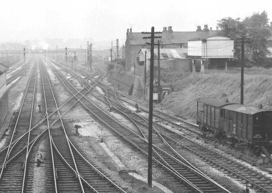 Close up showing the the throat to Small Heath & Sparkbrook station's up goods yard whilst on the right is the standard GWR water tank