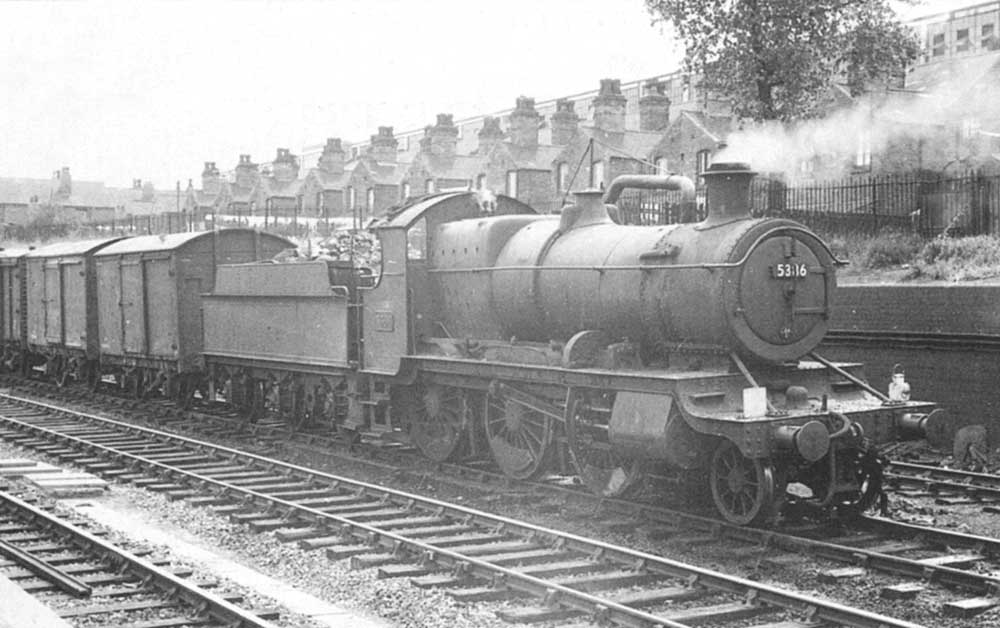 Ex-GWR 2-6-0 43xx class No 5386 at the head of a freight service pauses awaiting the all clear to proceed to one of Small Heath's goods sidings