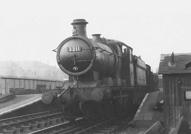 Ex-GWR 2251 class 0-6-0 No 3211 passing Soho and Winson Green station on the up relief line with a class H headcode circa 1955