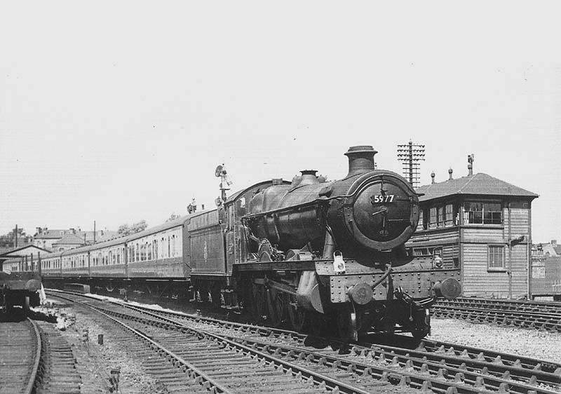 Ex-GWR 49xx (Hall) class 4-6-0 No 5977 Beckford Hall passes Soho and Winson Green Signal Box on the up relief line