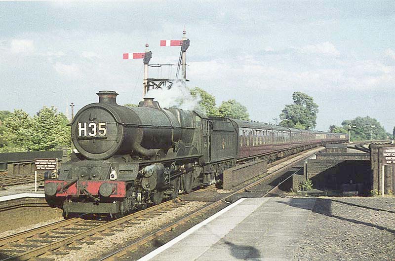 GWR 4-6-0 No 6006 'King George I' is seen at the head of the 5 10pm Paddington to Wolverhampton express as it enters Solihull station