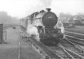 GWR 4-6-0 No 6028 'King George VI' is seen at the head of an up express service entering Solihull station's on the Up Main line