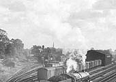 Close up showing Solihull's rebuilt goods yard and shed with numerous open wagons and vans in the sidings