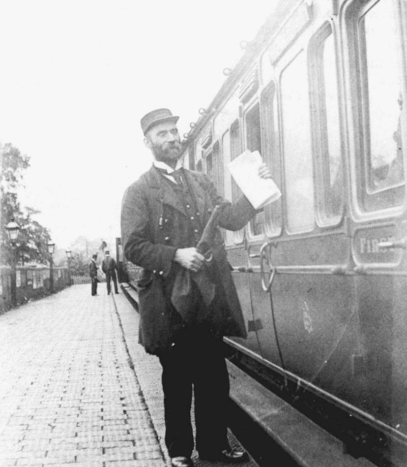 A GWR Guard awaits to be given the right of way on the 9:15am local service from Solihull to Snow Hill in 1899