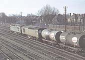 BR Type 3 Diesel locomotives No D6534 and D6506 pass through Solihull on an empty up oil train on 11th April 1964