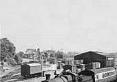Close up of Solihull's goods yard and shed with a four-wheel motor van buffered up to the landing dock
