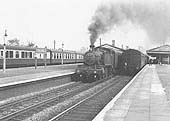 Ex-GWR 2-6-2T 5101 Class No 5194 stands at the down fast platform with a local stopping train to Birmingham