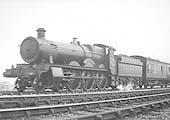 GWR 4-6-0 Saint class No 2941 'Eaton Court' is seen at the head of a down express as it approaches Solihull station