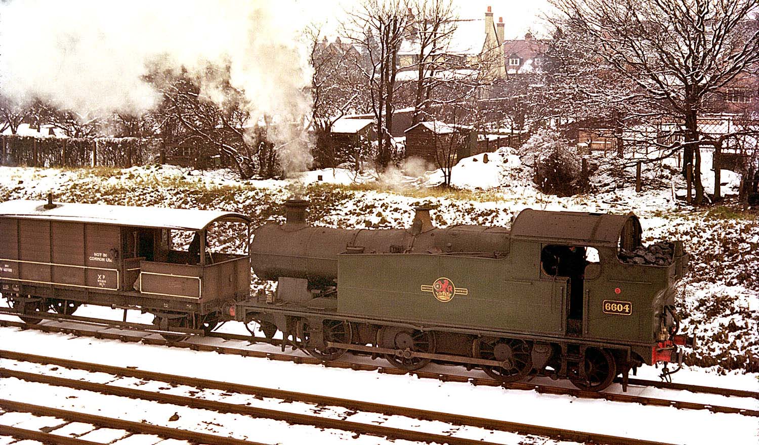 Ex-GWR 0-6-2T No 6604 is seen on a trip working, shunting Solihull goods yard in January 1962