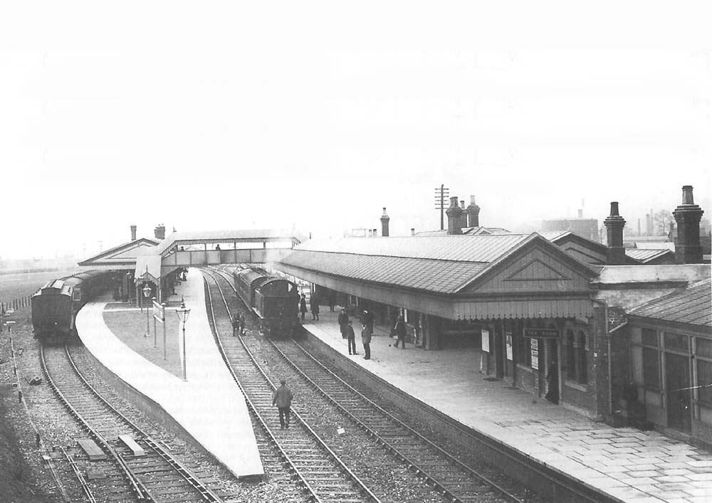 Close up showing Stratford on Avon station and the two local passenger trains standing in the down platform and the up 'bay' platform