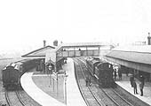 Close up showing Stratford on Avon station and the two local passenger trains standing in the down platform and the up 'bay' platform