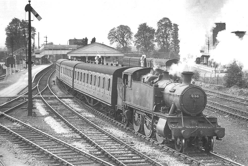 Ex-GWR 2-6-2T 'Large Prairie' No 5166 is seen departing the up platform on an afternoon three-coach service to Snow Hill on Sunday 21st April 1957