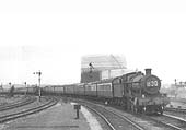 An unidentified ex-GWR 4-6-0 Grange class locomotive heads the 10:50am service from Wolverhampton to Minehead and Ilfracombe