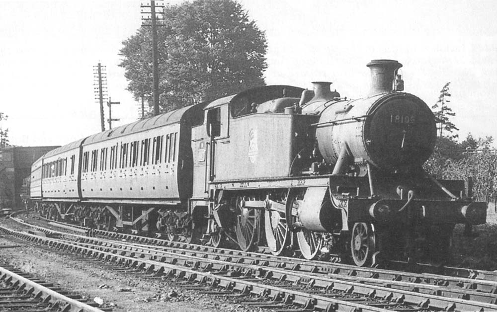 Ex-GWR 2-6-2T 'Large Prairie' No 8105 is seen passing the up refuge siding on the 5:05pm Moor Street service to Evesham service on 26th July 1952
