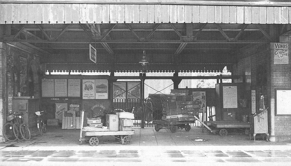 Looking towards  the parcels enclosure from the island platform with the parcels office on the left and refreshment room on the right