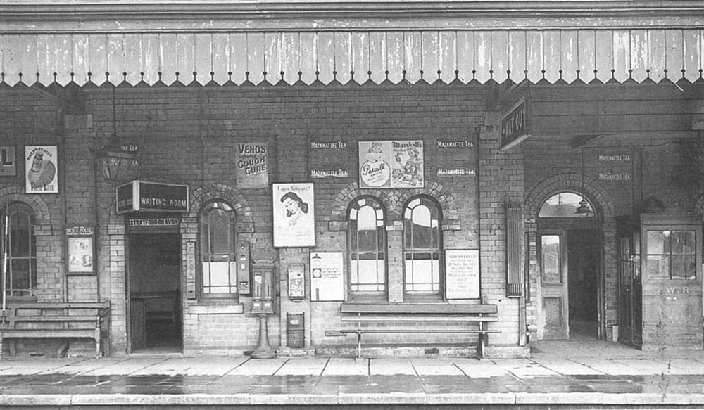 View from the island platform of the waiting room entrance,  station master's office, exit and ticket collector's booth on platform one