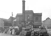 View of Flower & Son Ltd's brewery shed and boilerhouse and chimney seen from the back of Stratford on Avon station's goods yard