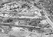 Aerial view of Stratford upon Avon's gas works and sidings, Flower & Sons Brewery and  the GWR's goods yard adjacent to the Birmingham Road