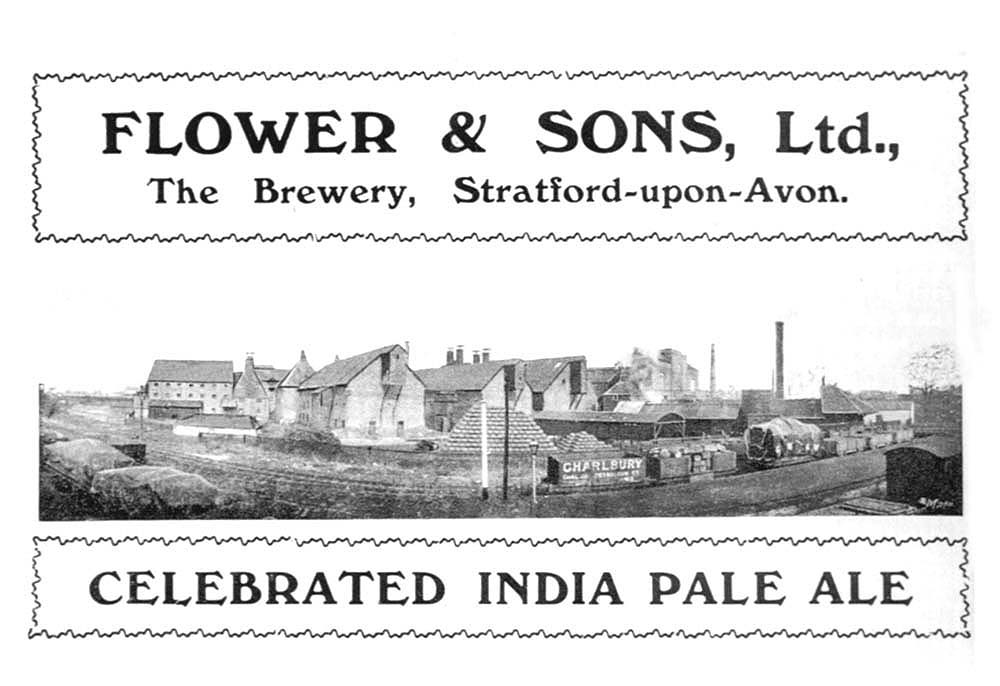A Flower & Sons Ltd beer bottle label depicting the brewery in a very well kept state with railway wagons standing in the goods yard
