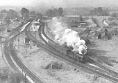 Stratford-upon-Avon Station in June 1964 with ex Great Western Railway 0-6-0 2251 class No 2211 departing on the 8:43am to Leamington