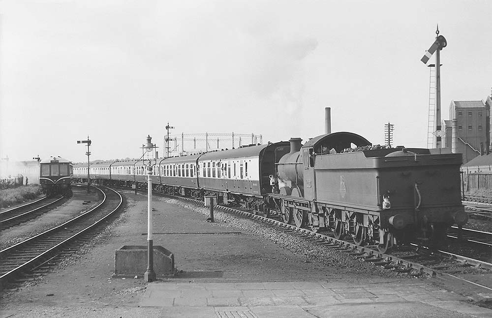 Ex-Great Western Railway 0-6-0 2251 Class No 2257 is seen providing banking assistance to an up express service from Stratford upon Avon on 23rd May 1959