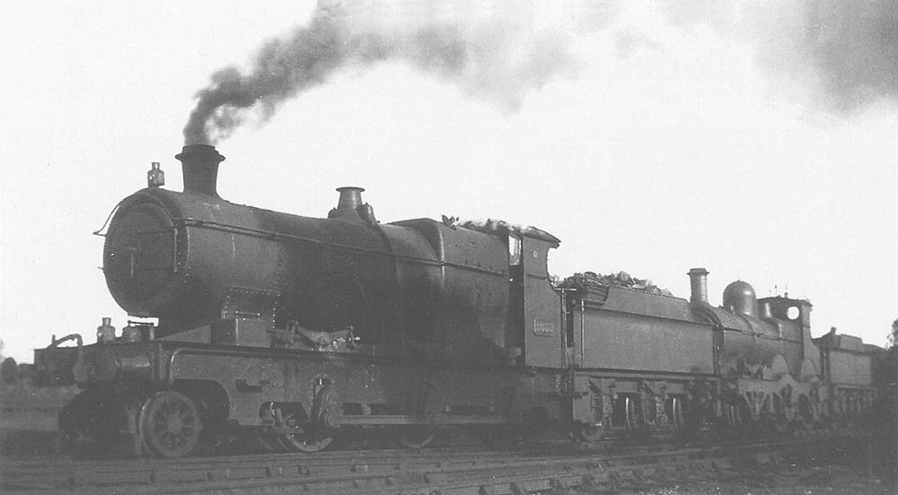 GWR 2-6-0 Aberdare class No 2633 is pulling 'dead' GWR 2-4-0 Barnum class No 3225 on 17th April 1935