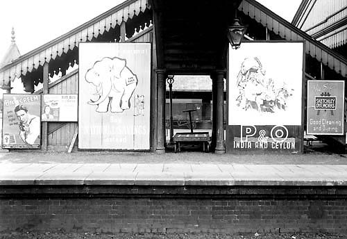 View of the pair of staircases which ran from either side of to the passenger footbridge down on to the island platforms