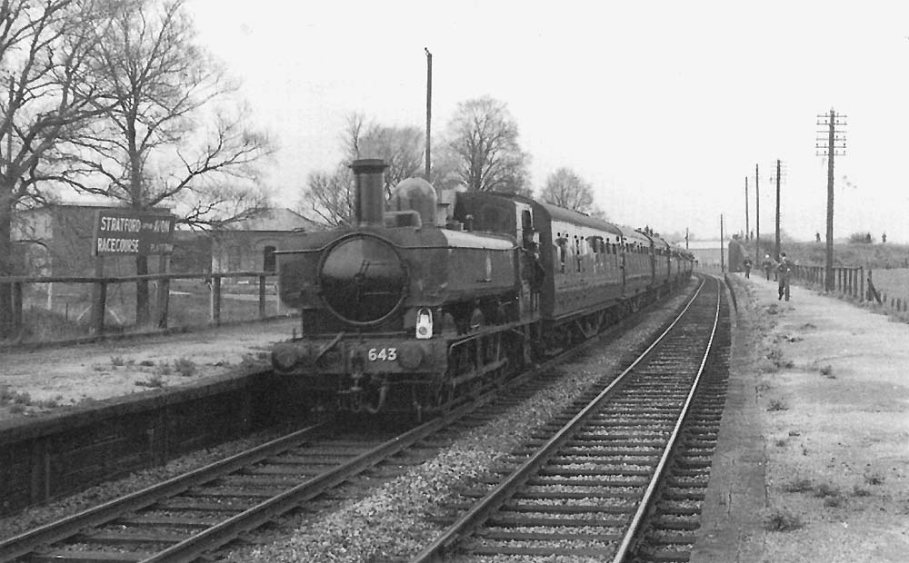 Restored to GWR livery 0-6-0PT 64xx class No 6435 is seen standing at the racecourse up platform whilst on a SLS special on 24th April 1965