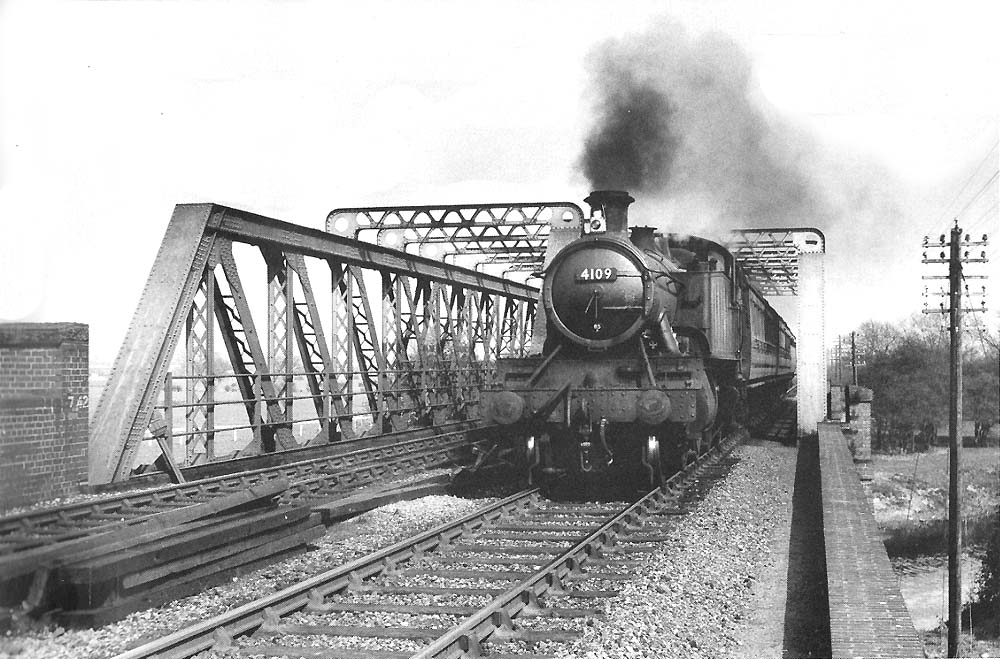 Ex-Great Western Railway 5101 class 2-6-2T large prairie No 4109 crossing the lattice girder bridge over the River Avon adjacent to Stratford Racecourse