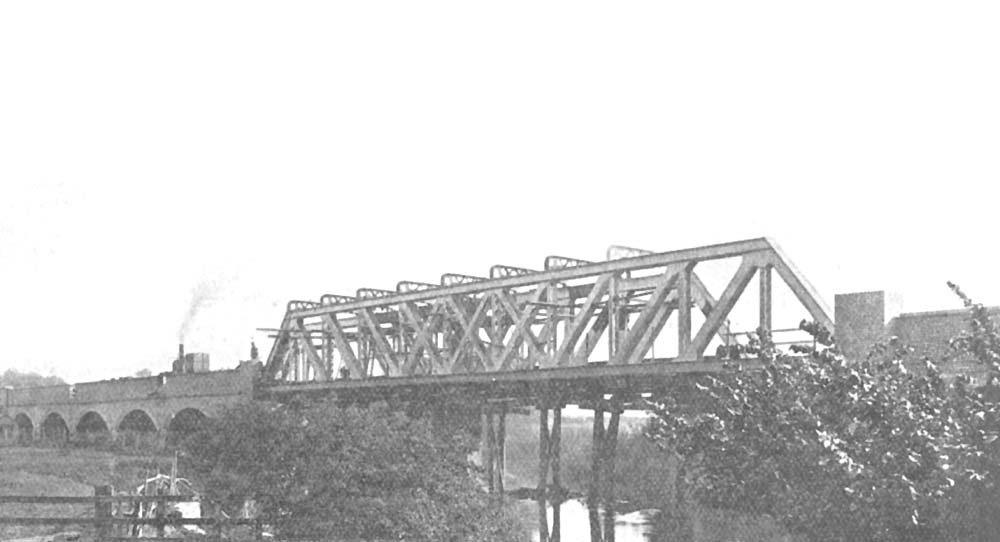 The Pratt truss lattice girder bridge in the final stages of construction at Stannals, south of Stratford-upon-Avon