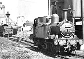 Ex-Great Western Railway 0-4-2T 58xx class No 5813 at the coaling stage at Stratford-on-Avon shed on 28th April 1957