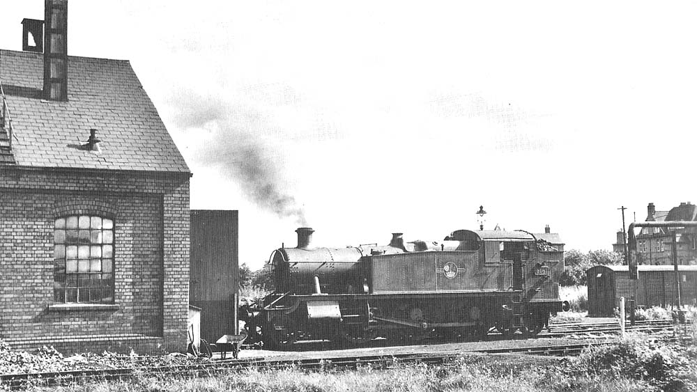 British Railways built 2-6-2T 5101 class large prairie No 4161 standing in front of the engine shed on 20th September 1958