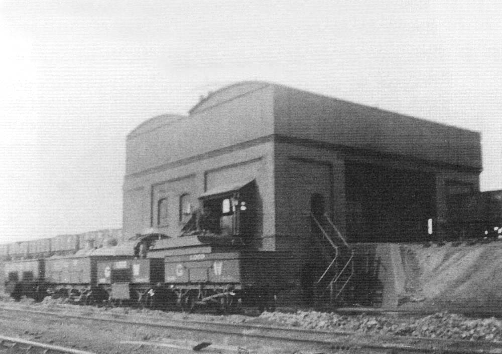Tyseley's double sided coaling station with two elevated sidings passing through the centre with a large water tank overhead