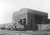 Tyseley's double sided coaling station with two elevated sidings passing through the centre with a large water tank overhead