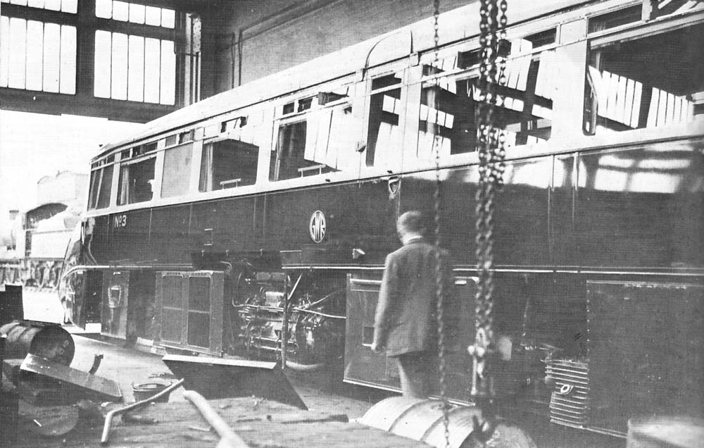 Great Western Railway Streamlined Diesel Railcar No 3 with engine covers removed in the Tyseley Repair Shop on a Saturday in 1935