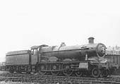 GWR 4-6-0 Hall class No 5956 'Horsley Hall' with steam gently escaping stands on one of Tyseley shed's stabling roads