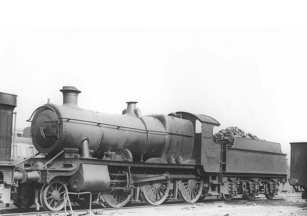 GWR 2-6-0 No 7320, a 43xx class locomotive, is seen fully coaled standing in line in Tyseley shed's yard circa 1939