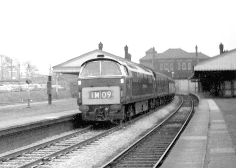 Western class diesel-hydraulic locomotives No D1072 is seen at the head of the 09 10 am Birmingham to Paddington express on 15th Feb 1965