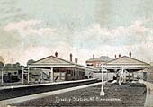 A 1906 coloured Postcard showing the station being built prior to its opening in October of that year