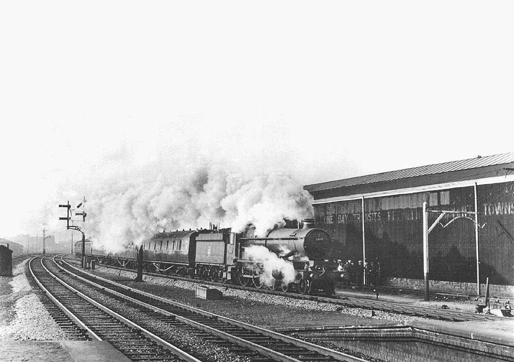 Ex-GWR 4-6-0 Castle Class No 5010 'Restormel Castle' passes Tyseley Goods shed on an up express train circa 1955