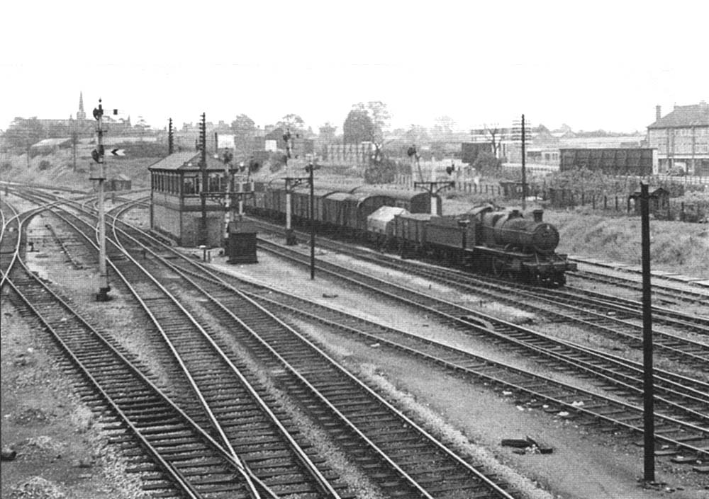 Ex-GWR 2-6-0 43xx Class No 6332 headsa freight train offthe North Warwickshire line circa 1960