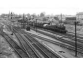 Ex-GWR 2-6-0 43xx Class No 6332 heads a goods train off the North Warwickshire line circa 1960