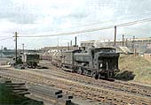 Ex-GWR 0-6-0PT No 8700 is seen shunting a rake of oil tank wagons into Tyseley goods yard's sidings in 1958