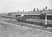 Ex-GWR 2-6-2T 'Prairie Tank' No 4133 at the head of a mineral train passes Tyseley station's down relief platform on the goods line to Moor Street