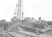 View of GWR 2-8-2T No 7238 after running in to a Luftwaffe bomb crater at Budbrook near Hatton on 17th May 1941